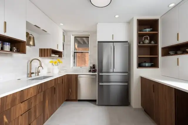 Historic home kitchen remodel with walnut lower cabinets, open wood shelving, white counters and a stainless refrigerator